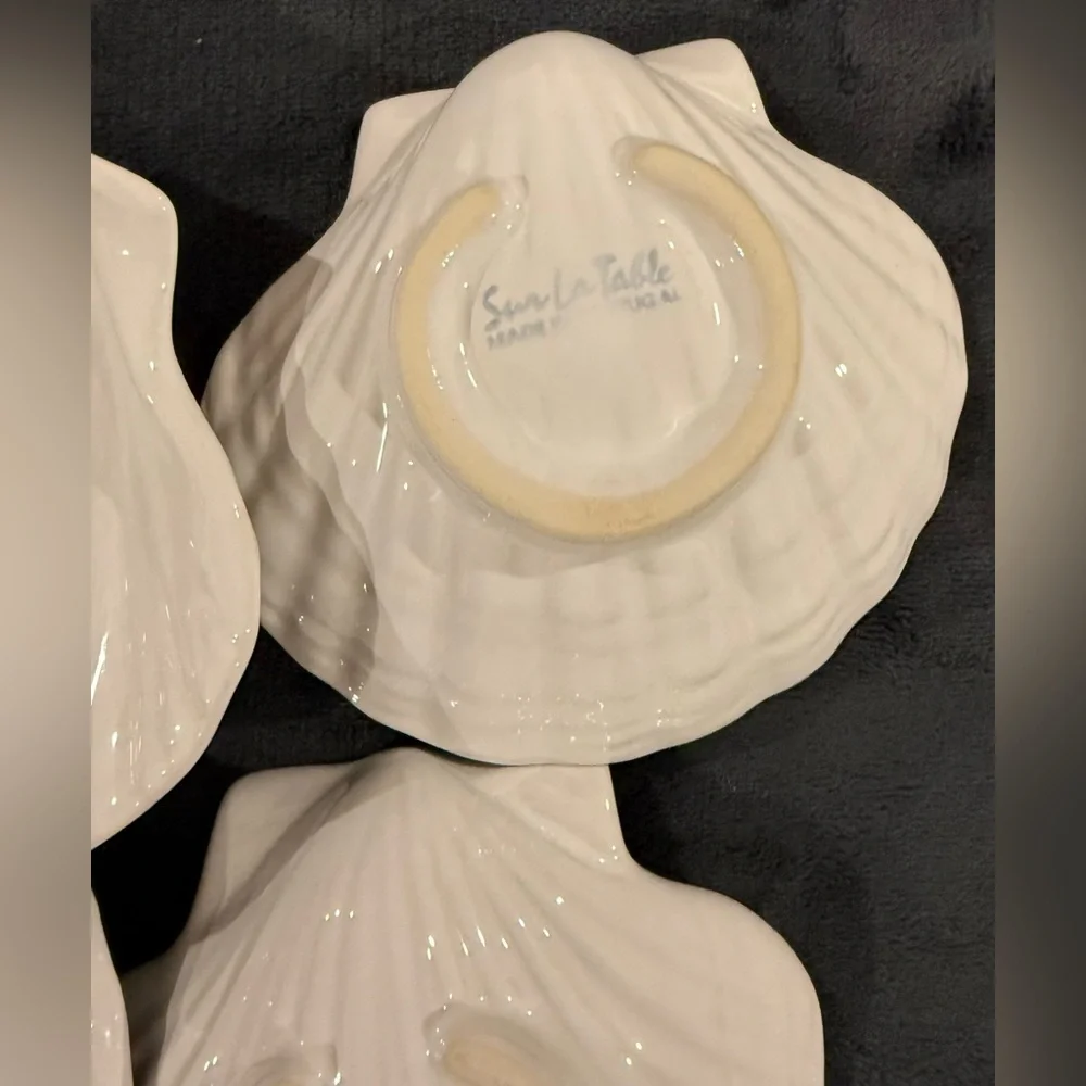 4 Sur La Table white, shell bowls. 5.5”